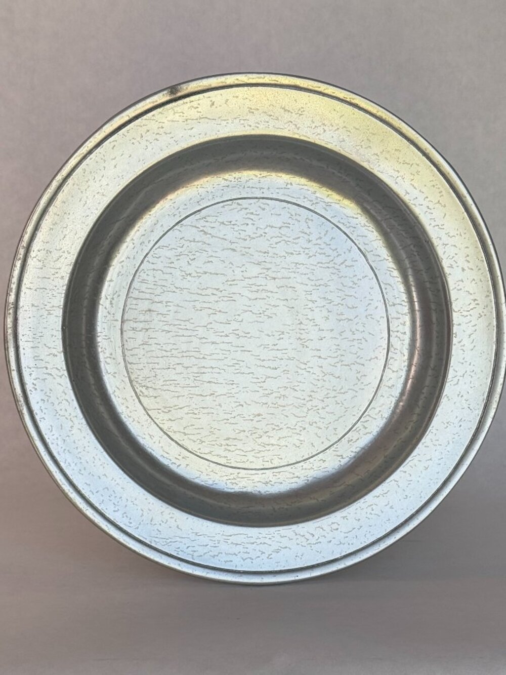 A rustic textured Pewter plate by "Wilton Columbia" Pewter.
